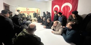 MHP'ye geçen 110 kişiye rozet takıldı